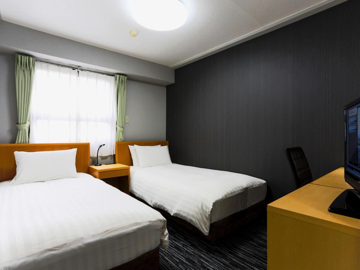 Business Hotel Sunpalace Tokio Buitenkant foto