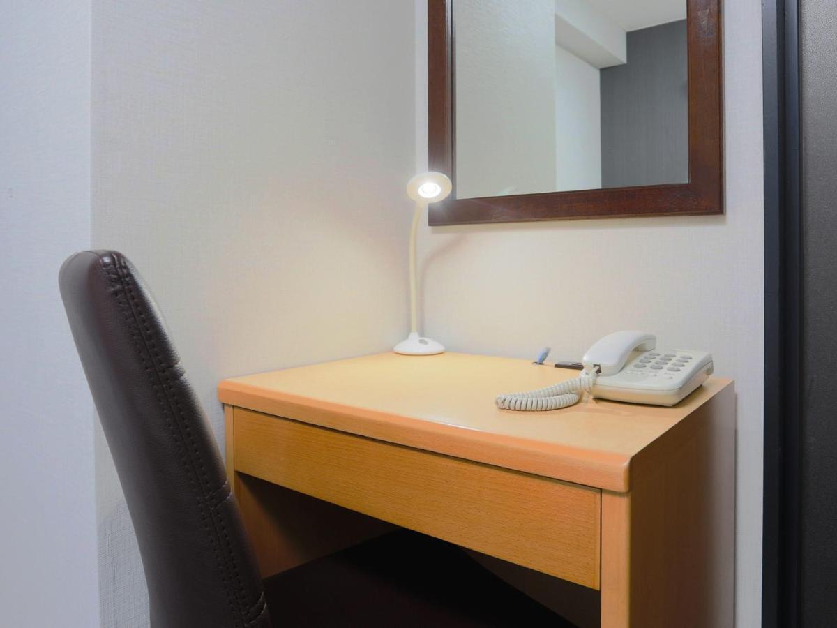 Business Hotel Sunpalace Tokio Buitenkant foto